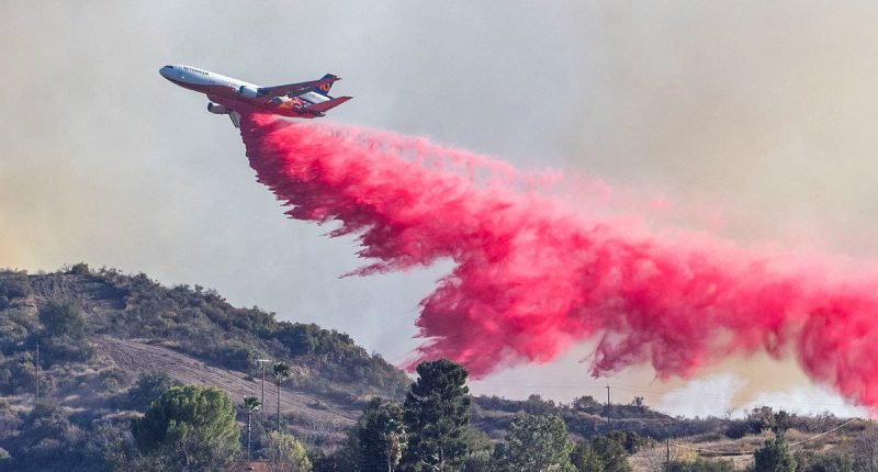 Fire retardant stains LA houses in attempts to slow killer blazes