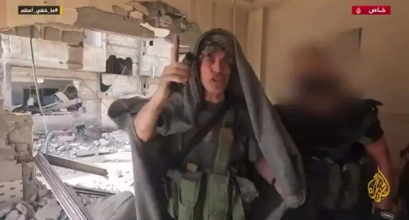 Footage of Yahya Sinwar amidst Gaza rubble.