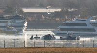 Search and rescue crews at a plane crash site in the Potomac River.