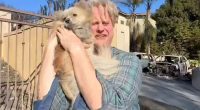 Man joyfully reunited with his dog after a fire.