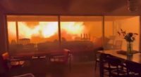 Huge flames can be seen outside the lounge window