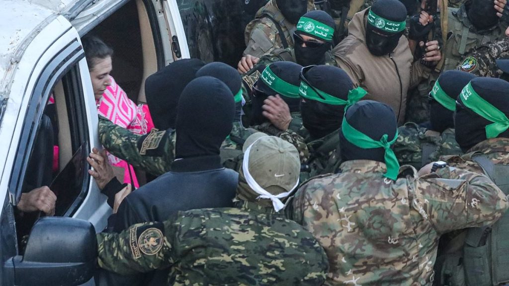 Hostages' terrifying handover: Chaos as first three women handed over