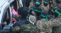 Hostages' terrifying handover: Chaos as first three women handed over