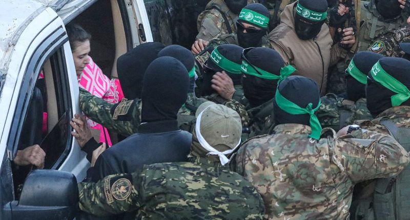Hostages' terrifying handover: Chaos as first three women handed over