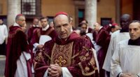Still from the film *Conclave 2024*, showing Ralph Fiennes as a cardinal.