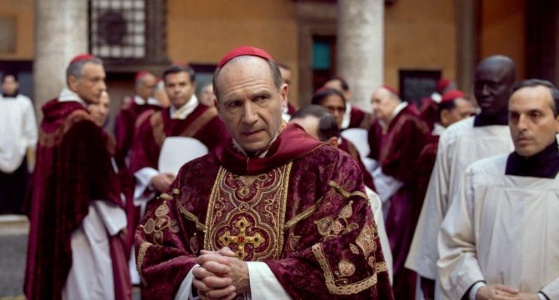 Still from the film *Conclave 2024*, showing Ralph Fiennes as a cardinal.