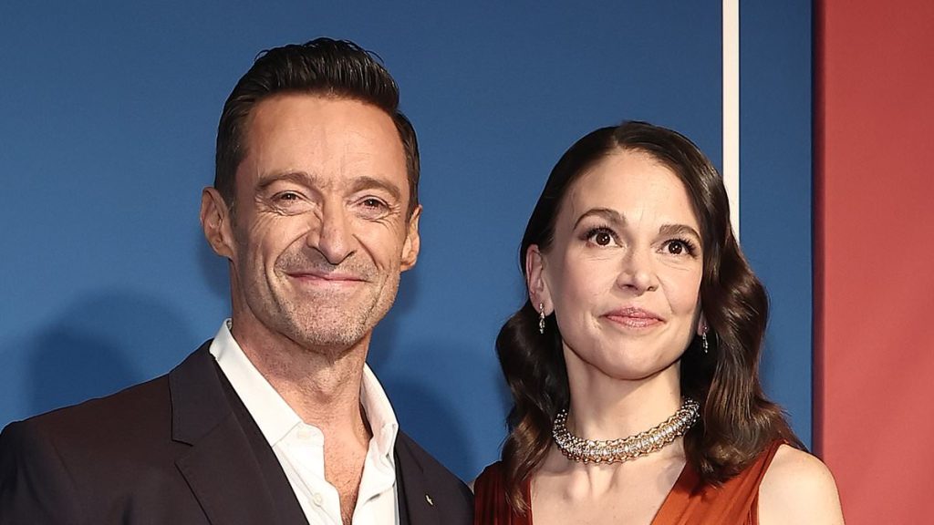 Hugh Jackman and Sutton Foster seen KISSING for first time