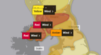 Map of Great Britain and Ireland showing weather warnings for wind and rain.