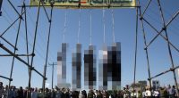 Five people hang from the nooses after they were executed in Iran in 2007
