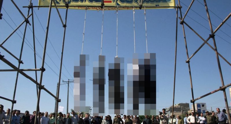 Five people hang from the nooses after they were executed in Iran in 2007