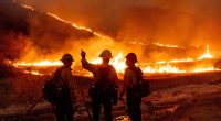 Fire crews battle the Kenneth Fire in the West Hills section of Los Angeles
