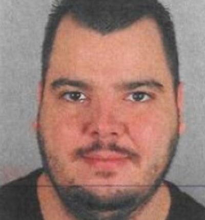 Mugshot of Jos Leijdekkers, wanted for drug trafficking and money laundering.