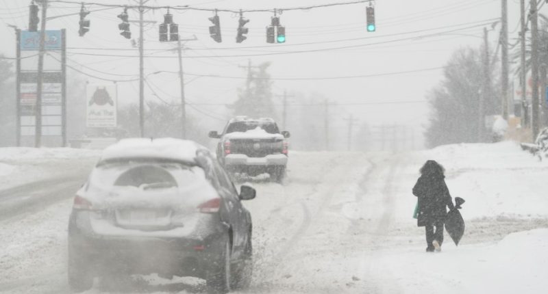 Heavy snow dumped on the streets in Florence, Kentucky, outside Cincinnati, Ohio, on Monday