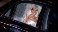 Melania Trump waving from a car after her wedding.