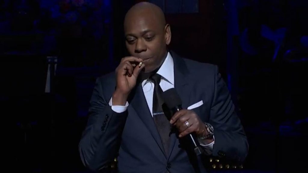 Moment Dave Chappelle tosses a lit cigarette off the stage at SNL