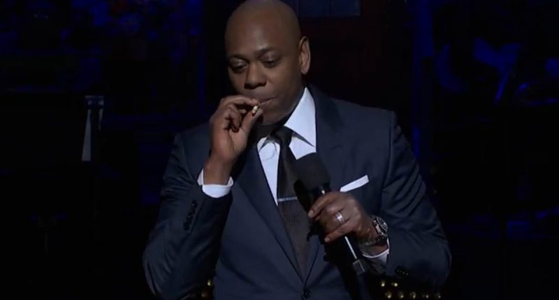Moment Dave Chappelle tosses a lit cigarette off the stage at SNL