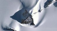 Aerial view of a pyramid-like structure in the Antarctic.