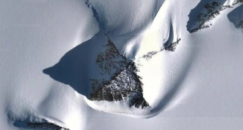 Aerial view of a pyramid-like structure in the Antarctic.