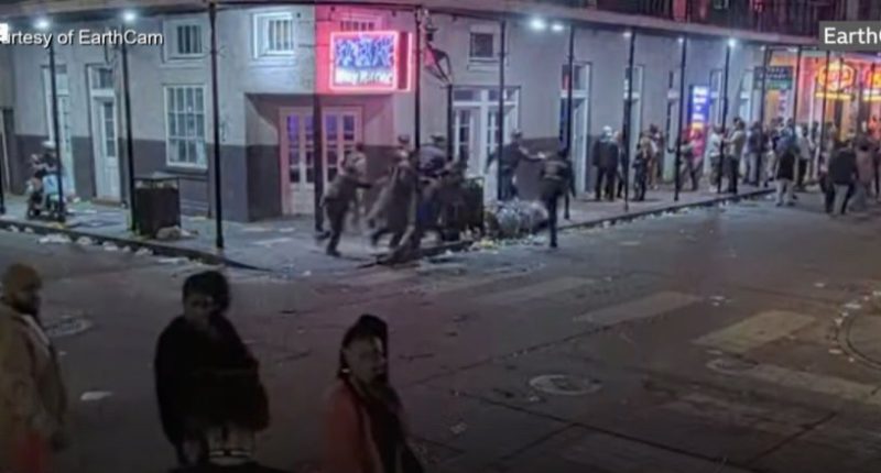 Cops rush toward the scene of danger as the New Orleans terror attack began