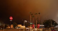 Over 50,000 under evacuation orders or warnings as wildfire imperils homes north of Los Angeles