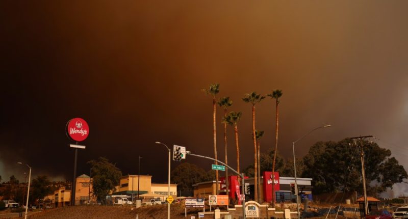Over 50,000 under evacuation orders or warnings as wildfire imperils homes north of Los Angeles