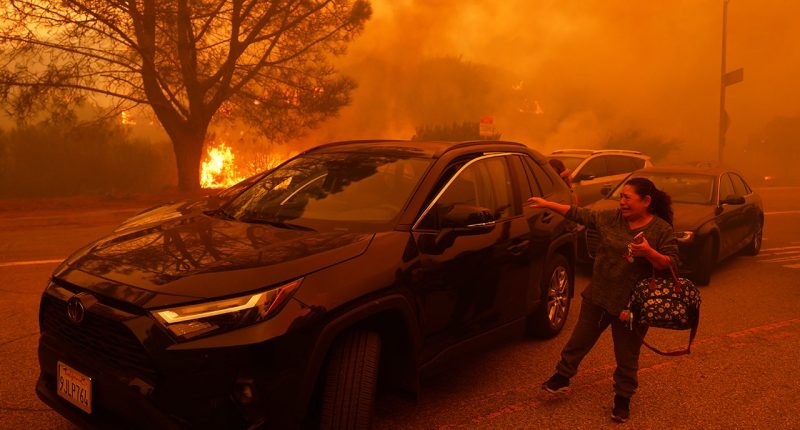 Pacific Palisades inferno forces thousands to flee California homes; 'life-threatening' winds whip wildfire