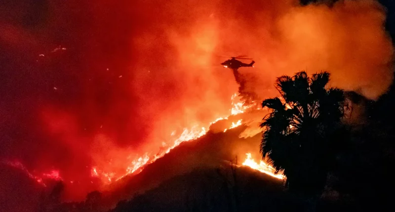 Retired Coast Guard helicopter commander details risks to air crews fighting LA fires