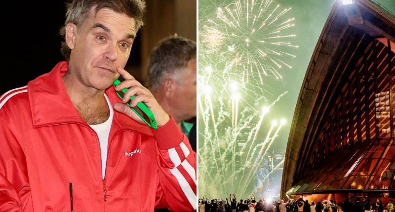 Robbie Williams blames singing crowd for New Year's Eve flub: 'Can you stop'