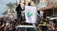 Palestinian Hamas militants in a celebratory parade following a ceasefire with Israel.