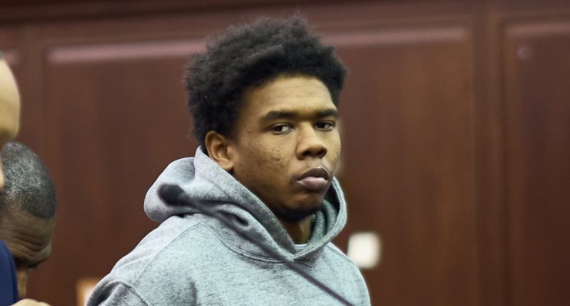 'Subway shover' looks on indifferently in court as he's arraigned