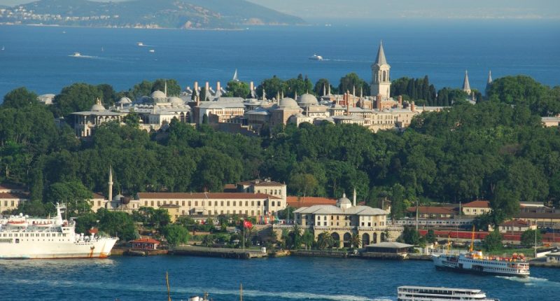 Aerial view of Topkapi Palace in Istanbul, Turkey, with the Golden Horn and Sea of Marmara in the background.