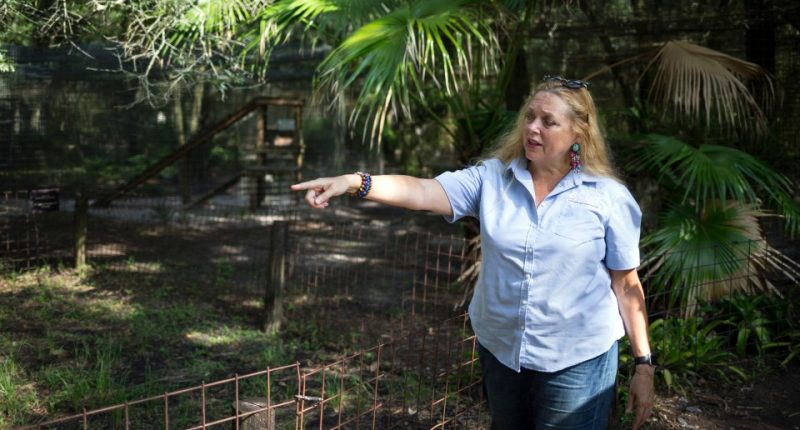 Carole Baskin pointing at something at Big Cat Rescue.