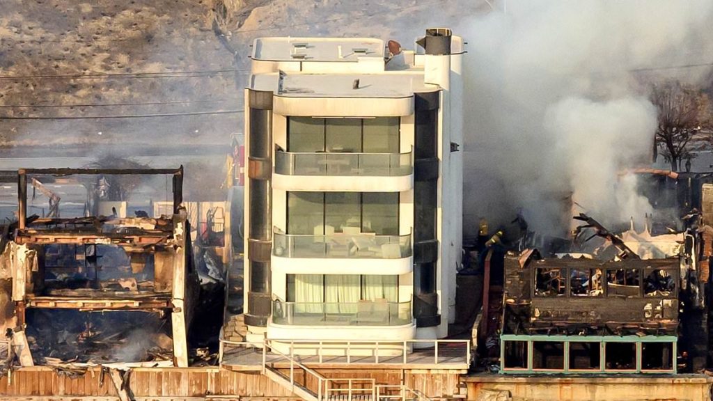Trash tycoon reveals how his 'miracle' Malibu house survived wildfires