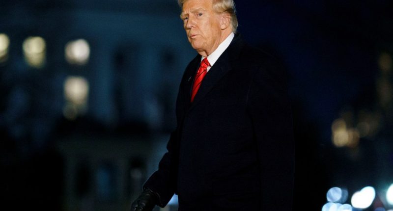 President Trump walking at night.
