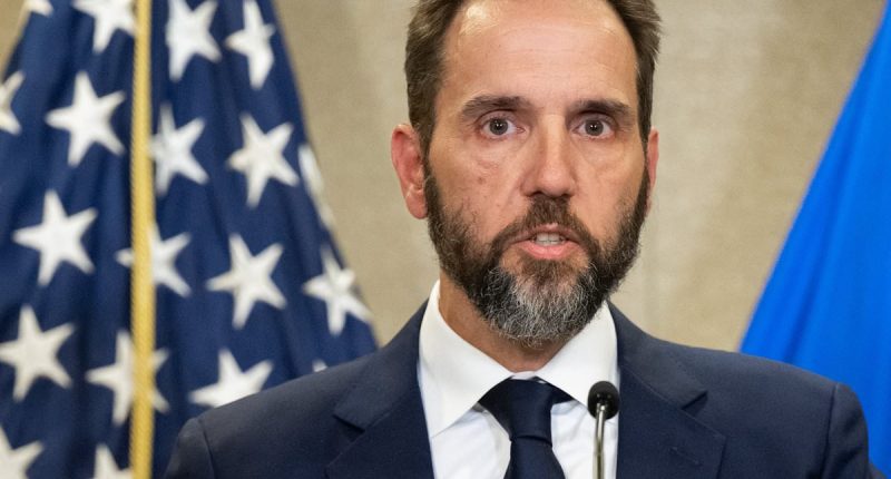 Trump gets revenge as he fires a dozen officials who investigated him