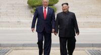 President Trump and Kim Jong Un walking together.