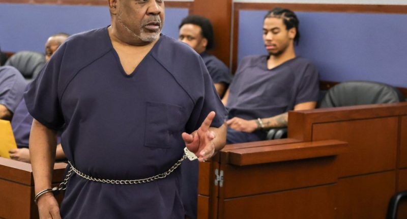 Duane Davis, handcuffed, in court during a hearing on a motion to dismiss murder charges.