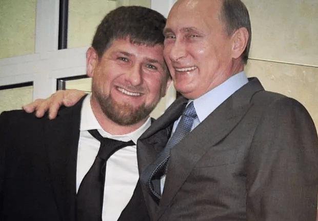 Kadyrov and Vladimir Putin pictured cosying up and beaming