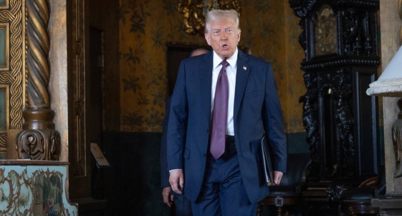 President-elect Donald Trump arrives to speak to members of the media during a press conference on January 7