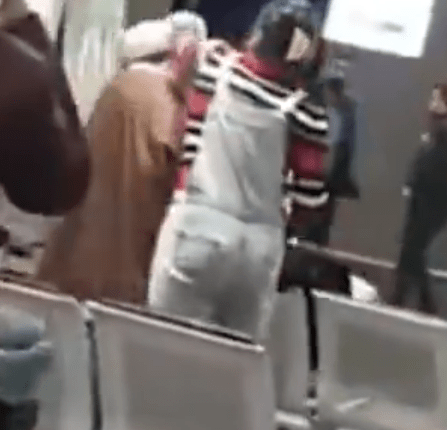 The moment a fed up Iranian woman snatched a turban off a brazen cleric at the airport