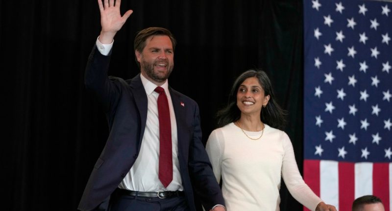 Sen. JD Vance and his wife at a campaign event.