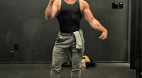 Man taking a selfie in gym attire.