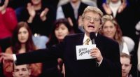 Chuck Conners worked as an announcer on Jerry Springer's (pictured) show