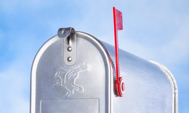 US mailbox with flag up.