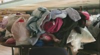 'It just warms our hearts': Local heating business collects coats for kids