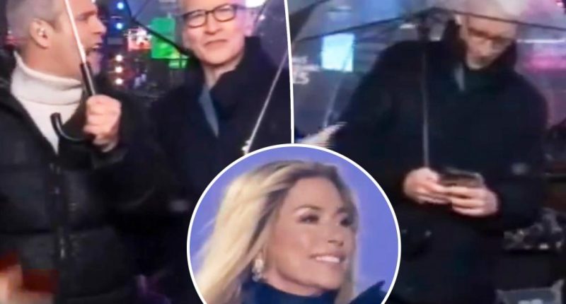Andy Cohen calls out Anderson Cooper for being on his phone during Shania Twain’s New Year’s Eve performance