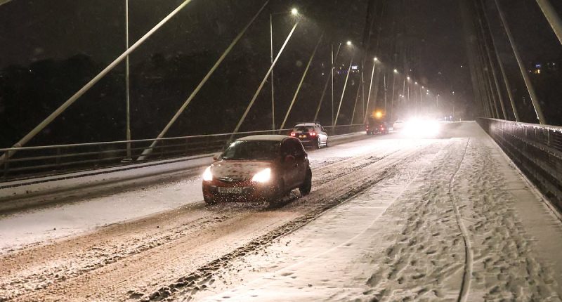 Big Freeze grips Britain: Snow storm causes travel mayhem, with flights grounded in Bristol and roads iced, and blackouts in England and Wales - as amber alert is issued with more than a FOOT set to fall