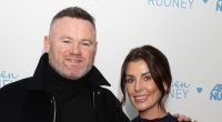 Coleen Rooney is supported by husband Wayne at wellness range launch