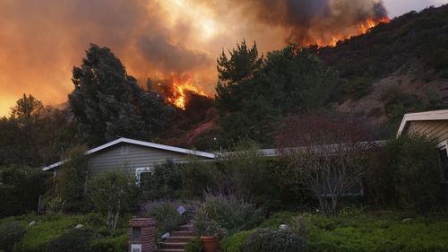 Death toll at 16 as firefighters gain ground in LA