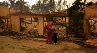 Families in shock begin to visit charred homes in Los Angeles area